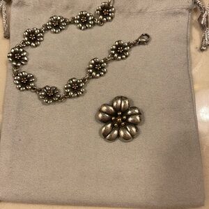 -RETIRED- April showers gold and silver flower pendant